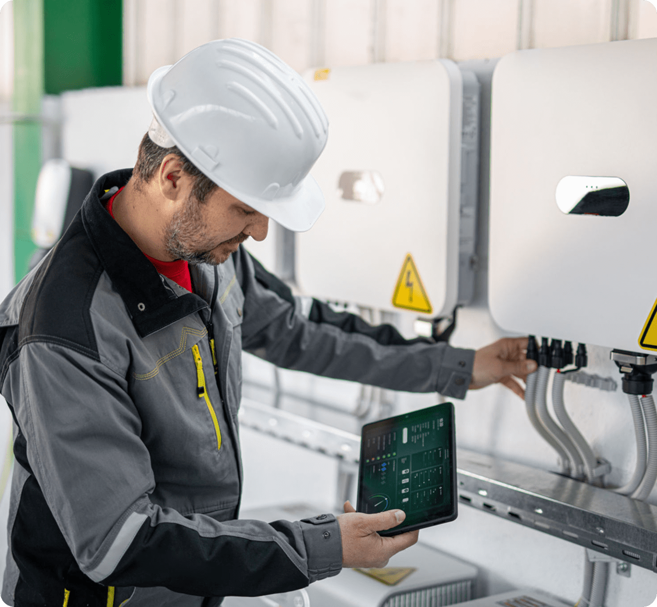 Technician inspecting electrical equipment